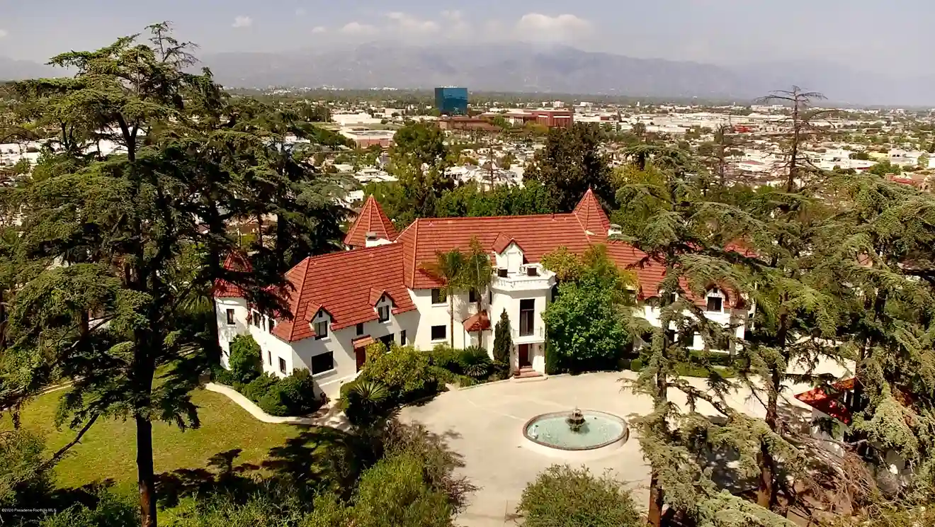 Aerial view of a beautiful historic mansion.