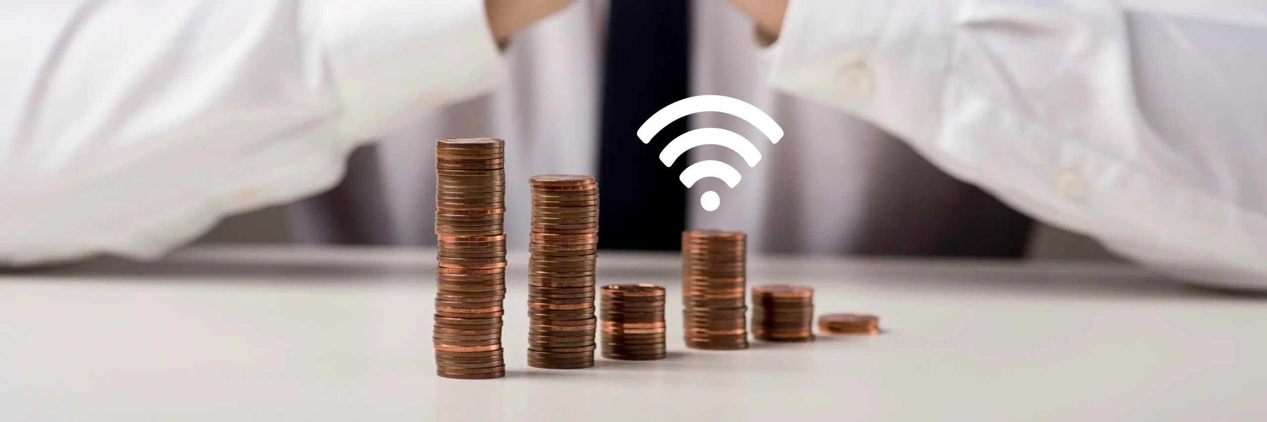 Stacked coins symbolizing financial growth with wifi icon
