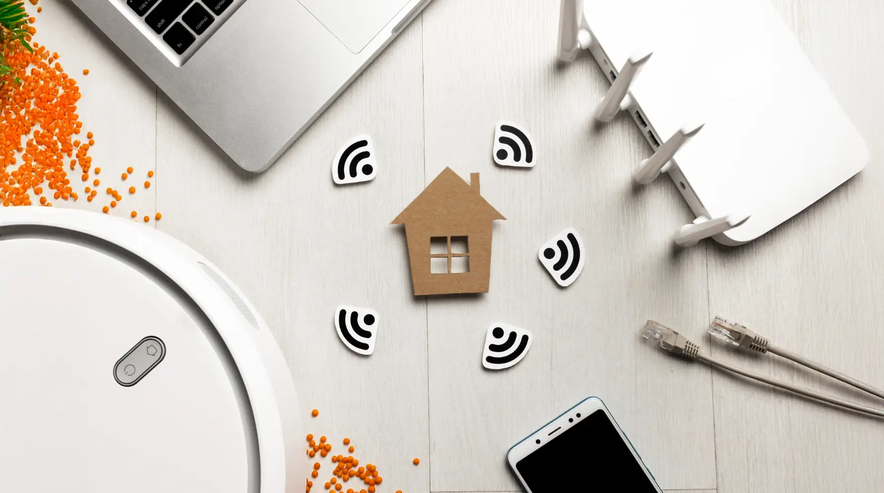 Home technology devices on a wooden surface