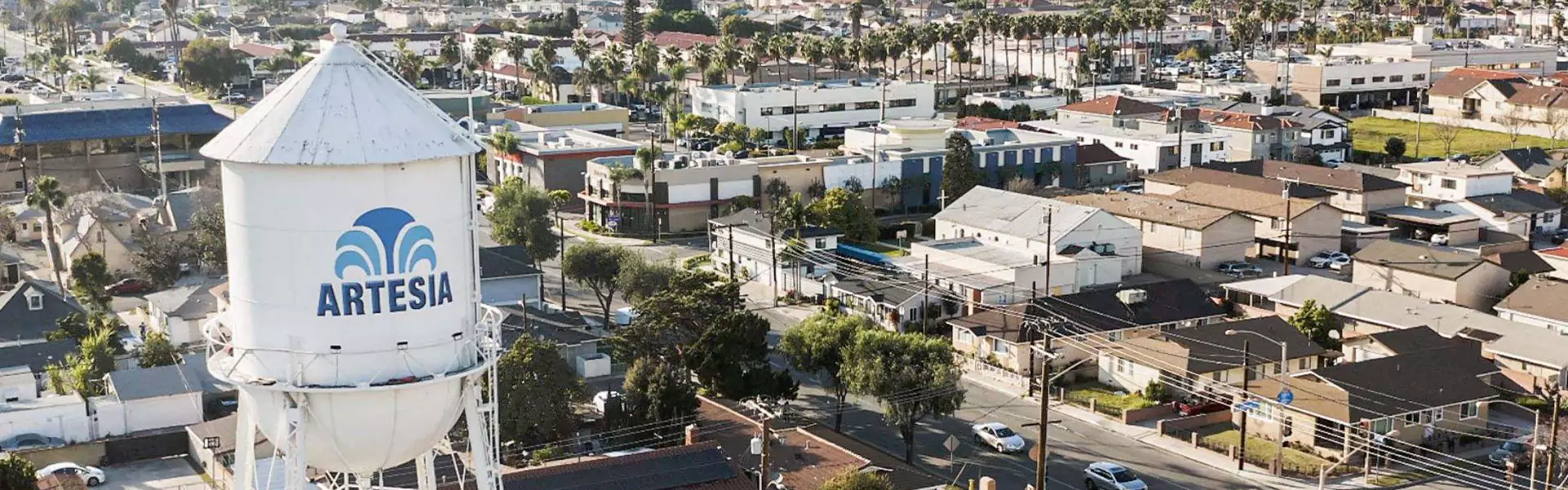 Artesia water tower overlooking suburban neighborhood.
