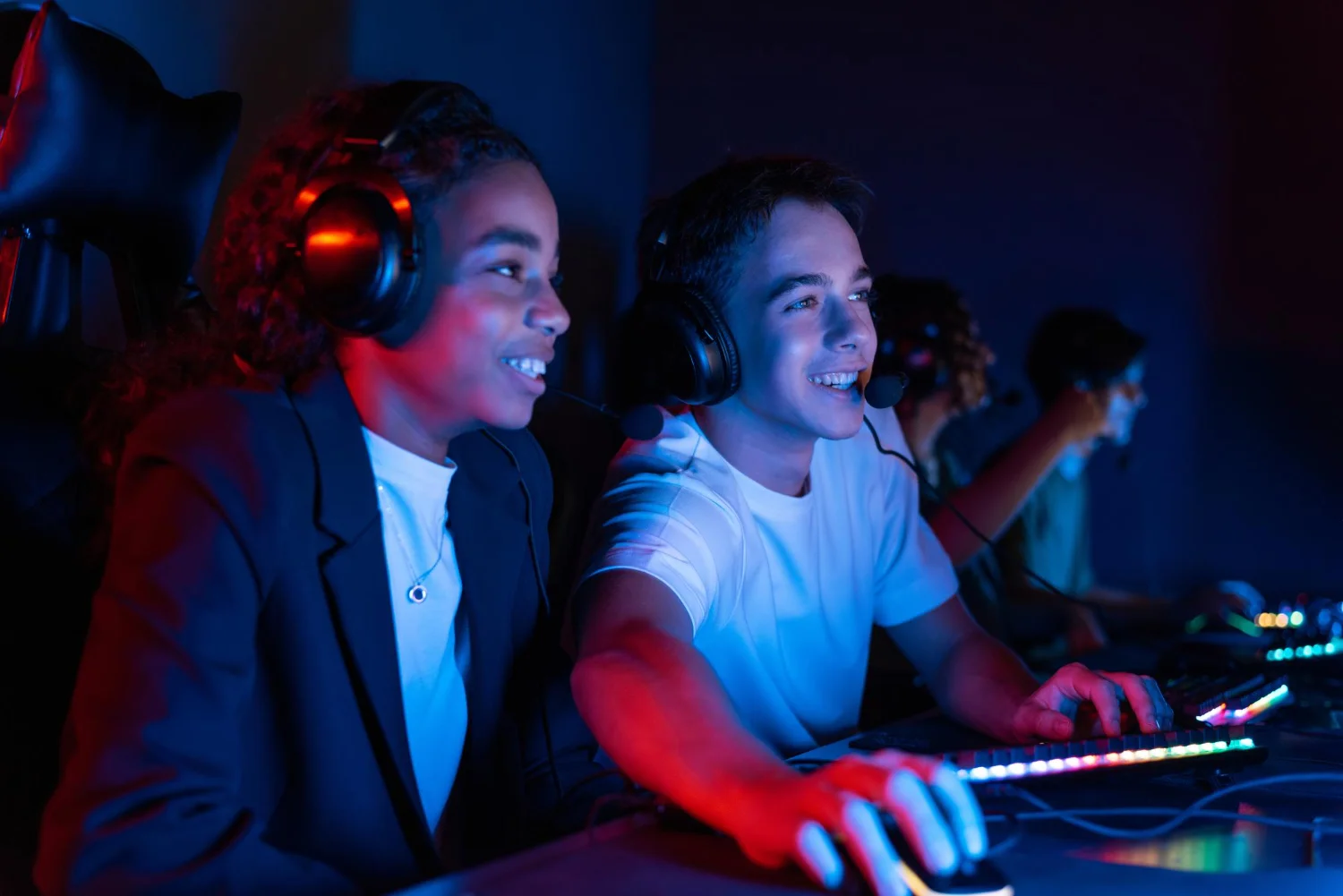 Young gamers enjoying playing video games together.